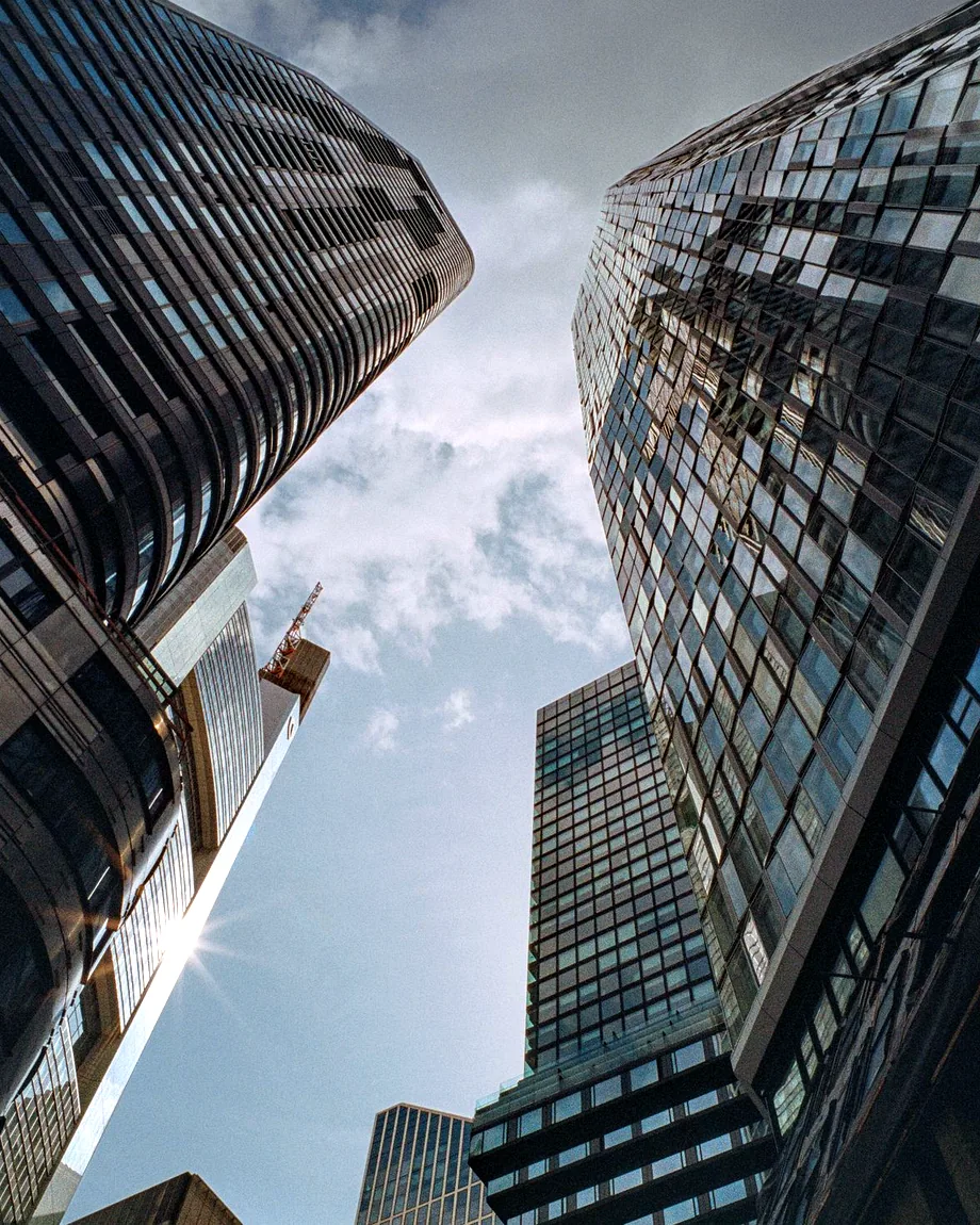 Modern financial-district towers seen from below