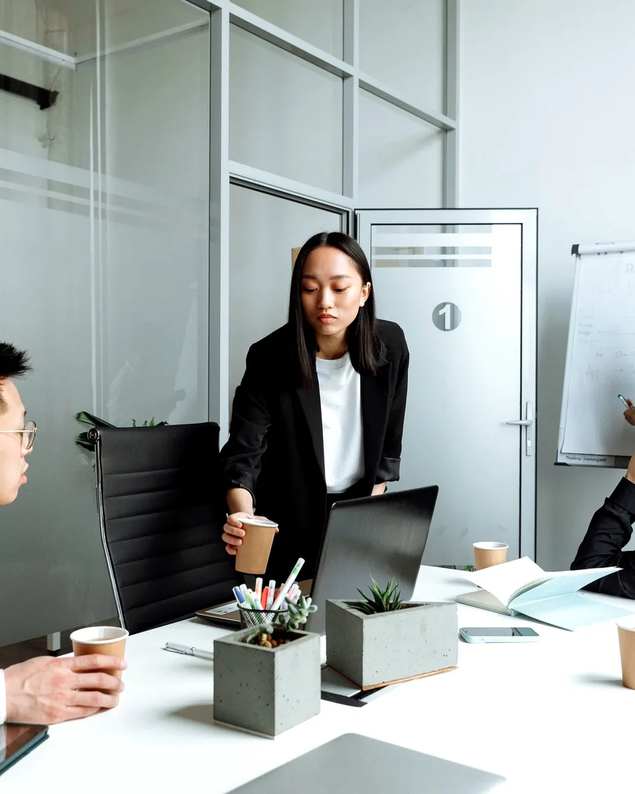 Professionals in a bright modern office in discussion